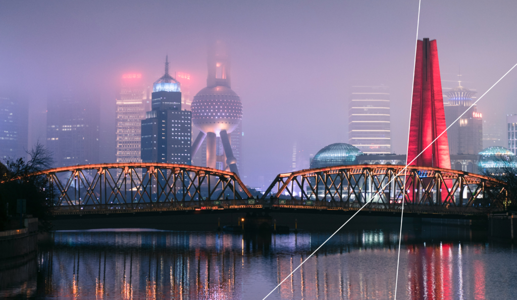 Modern city skyline with illuminated bridge, illustrating urban resilience and smart city development.